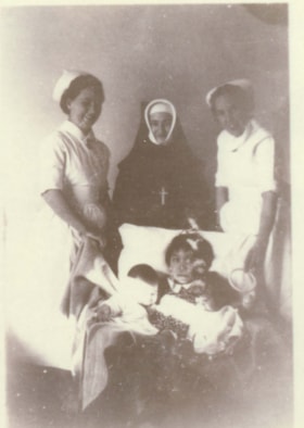 Ellen Bennetts (Collison), Sister Celine Marie, and Joan Lownds with unknown patient. (Images are provided for educational and research purposes only. Other use requires permission, please contact the Museum.) thumbnail