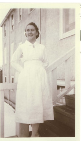 Ellen Bennetts (Collison) on the front steps of the hospital. (Images are provided for educational and research purposes only. Other use requires permission, please contact the Museum.) thumbnail