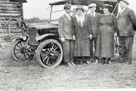 Group photo in front of a model T. (Images are provided for educational and research purposes only. Other use requires permission, please contact the Museum.) thumbnail
