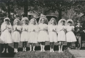 Children dressed for first communion. (Images are provided for educational and research purposes only. Other use requires permission, please contact the Museum.) thumbnail