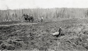 Man tilling clear cut ground. (Images are provided for educational and research purposes only. Other use requires permission, please contact the Museum.) thumbnail