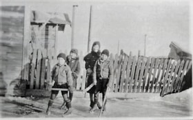 Children playing hockey. (Images are provided for educational and research purposes only. Other use requires permission, please contact the Museum.) thumbnail