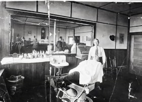 Barber shop interior. (Images are provided for educational and research purposes only. Other use requires permission, please contact the Museum.) thumbnail