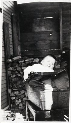 George Wright in his father's suitcase. (Images are provided for educational and research purposes only. Other use requires permission, please contact the Museum.) thumbnail