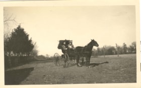 Alice Eggleston seated between two women in a horsedrawn buggy,. (Images are provided for educational and research purposes only. Other use requires permission, please contact the Museum.) thumbnail