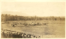 Crowd looking at horses on a racetrack. (Images are provided for educational and research purposes only. Other use requires permission, please contact the Museum.) thumbnail