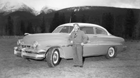 Harry Deguchi with car. (Images are provided for educational and research purposes only. Other use requires permission, please contact the Museum.) thumbnail