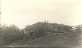 Log dwellings with grass roofs. (Images are provided for educational and research purposes only. Other use requires permission, please contact the Museum.) thumbnail