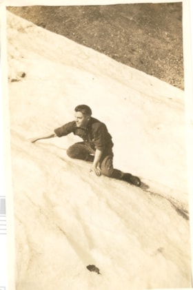 Gentleman kneeling on glacier. (Images are provided for educational and research purposes only. Other use requires permission, please contact the Museum.) thumbnail