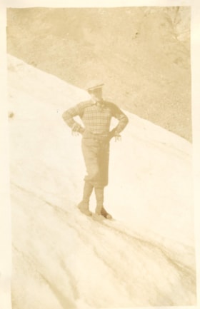 Gentleman standing on glacier. (Images are provided for educational and research purposes only. Other use requires permission, please contact the Museum.) thumbnail
