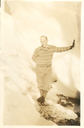 Gentleman standing on glacier. (Images are provided for educational and research purposes only. Other use requires permission, please contact the Museum.) thumbnail