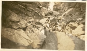 11 people posing in rock and ice. (Images are provided for educational and research purposes only. Other use requires permission, please contact the Museum.) thumbnail
