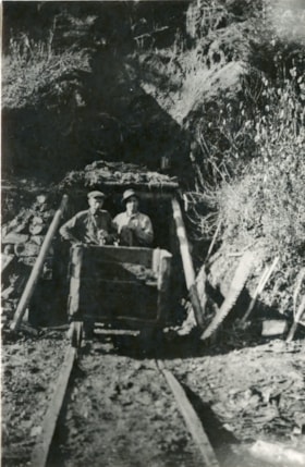 Two men in a mining car at No. 1 seam portal, Coal Creek Mine. (Images are provided for educational and research purposes only. Other use requires permission, please contact the Museum.) thumbnail