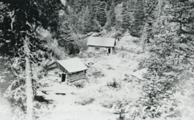 Three log buildings at Coal Creek Mine. (Images are provided for educational and research purposes only. Other use requires permission, please contact the Museum.) thumbnail