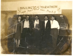 Bowling '65' Marathon banner with a group of people below. (Images are provided for educational and research purposes only. Other use requires permission, please contact the Museum.) thumbnail