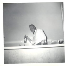 Bartender at Bowling Banquet. (Images are provided for educational and research purposes only. Other use requires permission, please contact the Museum.) thumbnail