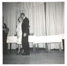 Unidentified man and woman at bowling awards ceremony. (Images are provided for educational and research purposes only. Other use requires permission, please contact the Museum.) thumbnail