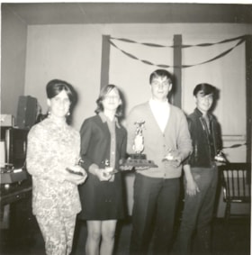 Four teens at Junior Bowling Awards ceremony. (Images are provided for educational and research purposes only. Other use requires permission, please contact the Museum.) thumbnail