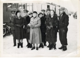 Group photo in front of train. (Images are provided for educational and research purposes only. Other use requires permission, please contact the Museum.) thumbnail