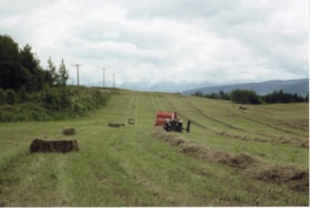 Baling hay on Morris Farm. (Images are provided for educational and research purposes only. Other use requires permission, please contact the Museum.) thumbnail