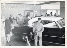 Interior of car dealership. (Images are provided for educational and research purposes only. Other use requires permission, please contact the Museum.) thumbnail