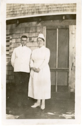 Art Dickson, orderly, and Nurse Callendar in front of the first hospital in Smithers. (Images are provided for educational and research purposes only. Other use requires permission, please contact the Museum.) thumbnail