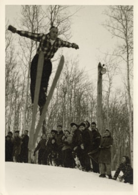 Crowd watching a ski jumper. (Images are provided for educational and research purposes only. Other use requires permission, please contact the Museum.) thumbnail
