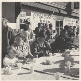 Centennial pancake breakfast on Main Street. (Images are provided for educational and research purposes only. Other use requires permission, please contact the Museum.) thumbnail