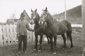 Joe Bourgon with two horses. (Images are provided for educational and research purposes only. Other use requires permission, please contact the Museum.) thumbnail