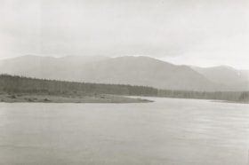 View of a lake with mountain range in the distance. (Images are provided for educational and research purposes only. Other use requires permission, please contact the Museum.) thumbnail