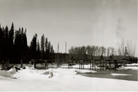 Bridge construction over frozen river. (Images are provided for educational and research purposes only. Other use requires permission, please contact the Museum.) thumbnail