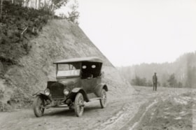 Man stopped on a dirt road. (Images are provided for educational and research purposes only. Other use requires permission, please contact the Museum.) thumbnail
