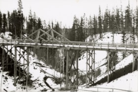 King post truss bridge over a unidentified creek. (Images are provided for educational and research purposes only. Other use requires permission, please contact the Museum.) thumbnail