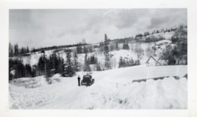 Billy Weber with car on snowy road. (Images are provided for educational and research purposes only. Other use requires permission, please contact the Museum.) thumbnail