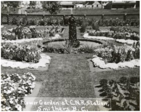 Flower garden at C.N.R. station, Smithers, B.C.. (Images are provided for educational and research purposes only. Other use requires permission, please contact the Museum.) thumbnail