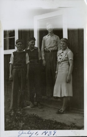 Dahlie children with Norm Tycho. (Images are provided for educational and research purposes only. Other use requires permission, please contact the Museum.) thumbnail