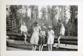 Else Dahlie (nee Widing) with children on a fence. (Images are provided for educational and research purposes only. Other use requires permission, please contact the Museum.) thumbnail
