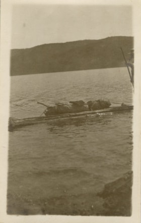 Man on raft. (Images are provided for educational and research purposes only. Other use requires permission, please contact the Museum.) thumbnail
