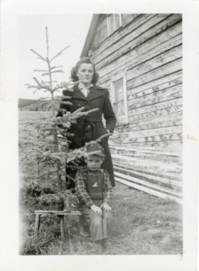 Kitty Walsh (nee Mesich) and Tom Mesich at home on Adams Road, Smithers, B.C.. (Images are provided for educational and research purposes only. Other use requires permission, please contact the Museum.) thumbnail