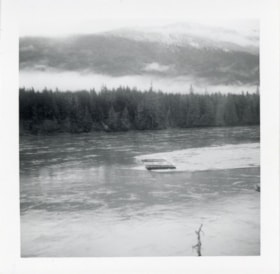 Canadian National Railways derailment, train car floating in the Bulkley River. (Images are provided for educational and research purposes only. Other use requires permission, please contact the Museum.) thumbnail