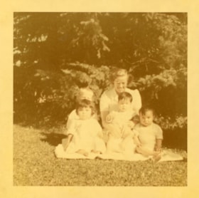 Bulkley Valley District Hospital nurse with children. (Images are provided for educational and research purposes only. Other use requires permission, please contact the Museum.) thumbnail