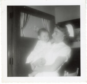 Bulkley Valley District Hospital, nurse holding indigenous baby. (Images are provided for educational and research purposes only. Other use requires permission, please contact the Museum.) thumbnail
