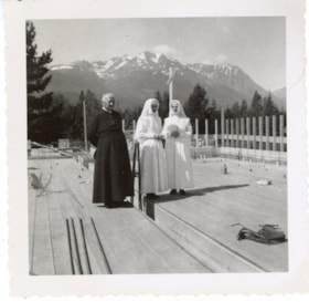 Bulkley Valley District Hospital, Father Godfrey with 2 unidentified Sisters of St. Ann at new Hospital addition site. (Images are provided for educational and research purposes only. Other use requires permission, please contact the Museum.) thumbnail