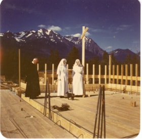 Bulkley Valley District Hospital, Father Godfrey with two unidentified Sisters of St. Ann at new Hospital addition site. (Images are provided for educational and research purposes only. Other use requires permission, please contact the Museum.) thumbnail