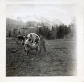 Bulkley Valley District Hospital, unloading patient from helicopter. (Images are provided for educational and research purposes only. Other use requires permission, please contact the Museum.) thumbnail