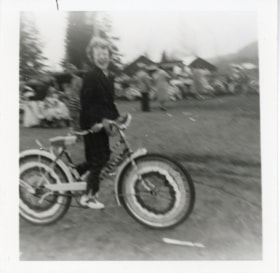 Smithers Elks Lodge celebration, Sheila Clarkston on a bike. (Images are provided for educational and research purposes only. Other use requires permission, please contact the Museum.) thumbnail