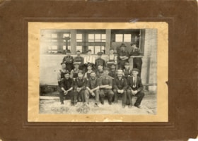 Group of workers outside of the Smithers Grand Trunk Pacific Railway roundhouse. (Images are provided for educational and research purposes only. Other use requires permission, please contact the Museum.) thumbnail
