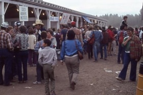 Crowd and booths at the Fall Fair. (Images are provided for educational and research purposes only. Other use requires permission, please contact the Museum.) thumbnail