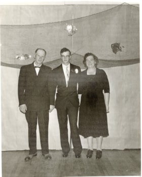 Ira Bowd with his parents at graduation. (Images are provided for educational and research purposes only. Other use requires permission, please contact the Museum.) thumbnail