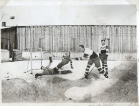 Charles Doodson, Robert and Johnny Dunlop, and Ken Warner playing hockey. (Images are provided for educational and research purposes only. Other use requires permission, please contact the Museum.) thumbnail